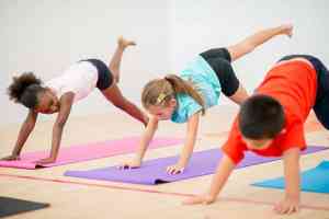 children doing yoga at the gym